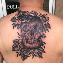 Ghostline Tattoo - Skull and flowers by @jenmartineztattoo