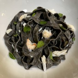 The Market By Buon Appetito - Homemade from scratch: Fresh Squid Ink Fettuccine w/ King Crab in a garlic butter sauce w/ fresh oregano leaves and a squeeze of lemon juice