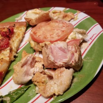 Bella Pizza - a plate of food on a table - Pizza Near Me - Hamburg, New York