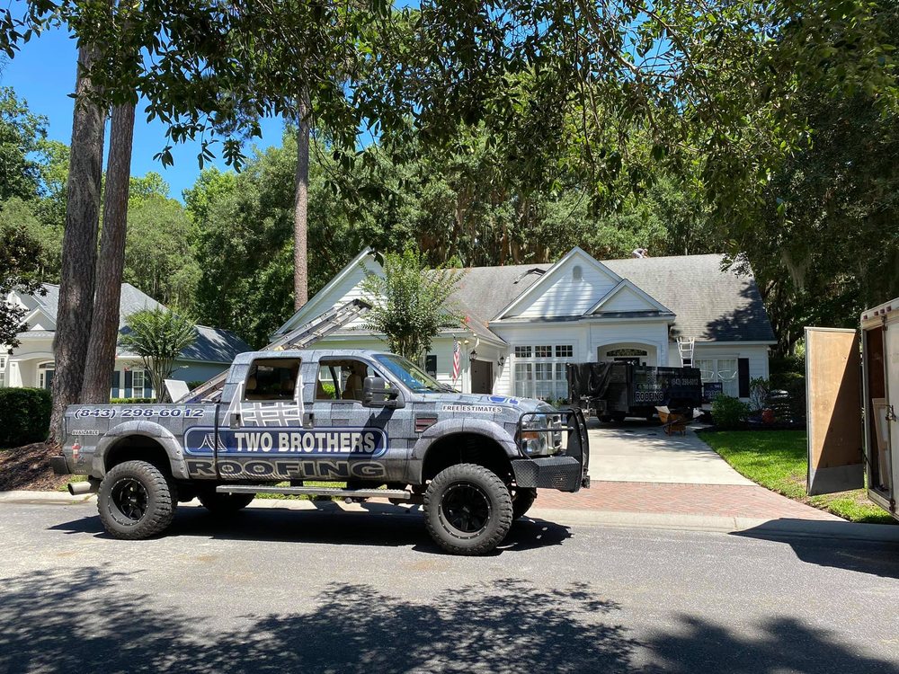 Slide of Two Brothers Roofing