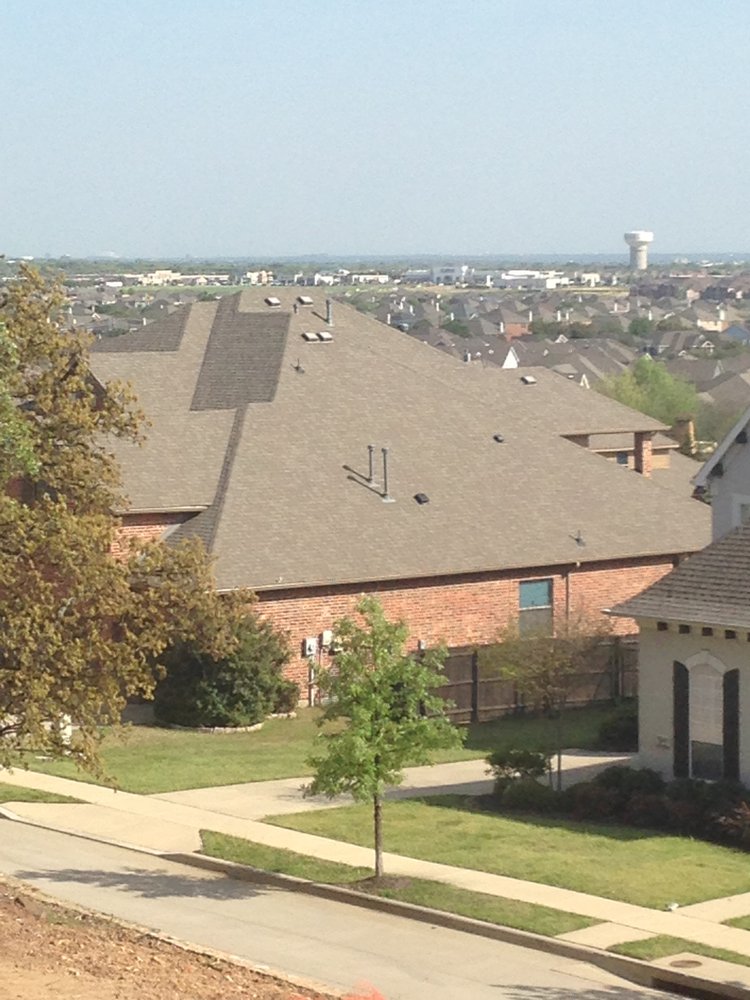 Slide of Cowboy Roofing