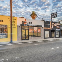Sweat Pilates - Front view of Sweat Pilates at 4049 Lincoln Blvd. displays the hand-painted logo with the tagline "Stretch | Strength | Rebound."