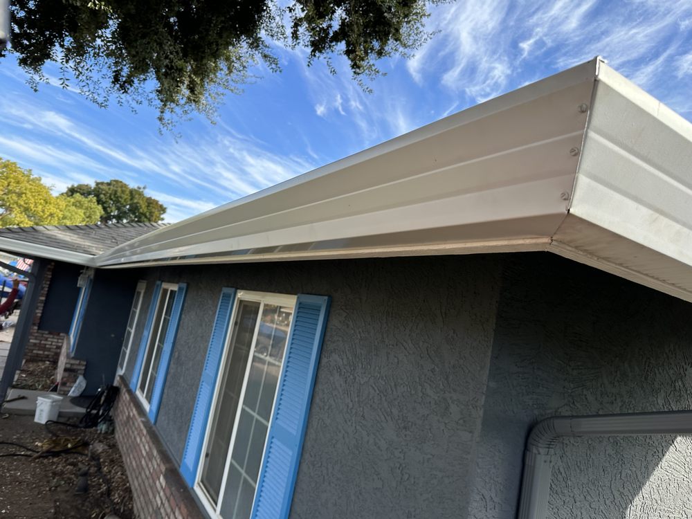 Slide of Claudex Roofing