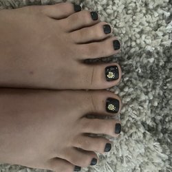 50 Stars Nail & Spa - Sticker placement on toes is strange and the sticker was ripped