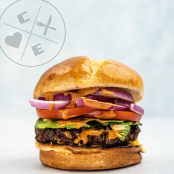 Clean Eatz - a hamburger with lettuce, tomato, onion, and cheese - Salad Near Me - Wyomissing, Pennsylvania Clean Eatz - a hamburger with lettuce, tomato, onion, and cheese - Salad Near Me - Wyomissing, Pennsylvania