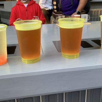 Pym Tasting Lab - 3 cups of Speakeasy Prohibition Amber Ale and 1 cup of Particle Fizz - Cocktail Bars Near Me - Anaheim, California Pym Tasting Lab - 3 cups of Speakeasy Prohibition Amber Ale and 1 cup of Particle Fizz - Cocktail Bars Near Me - Anaheim, California