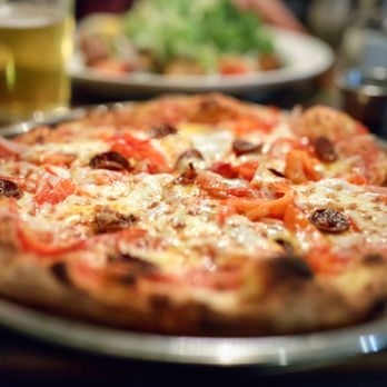 Le Paddock - Where's the MEAT!?!?... Basque Pizza $15 "tomato sauce, chorizo, peppers, onions, fresh mozzarella" - French Near Me - Brooklyn, New York