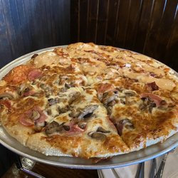 Rueben Pizza on half/ mushroom & Canadian bacon on half