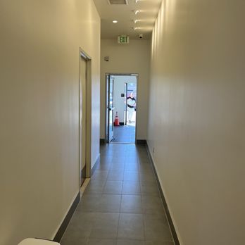 Re Coffee - Hallway leading to the bathroom and back parking lot - Desserts Near Me - Northridge, California Re Coffee - Hallway leading to the bathroom and back parking lot - Desserts Near Me - Northridge, California