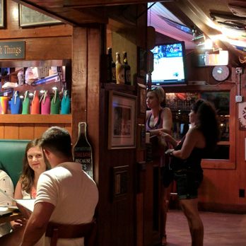 The Mucky Duck - At the counter/bar you can order tshirts and other mucky duck stuff. - Seafood Near Me - Captiva, Florida