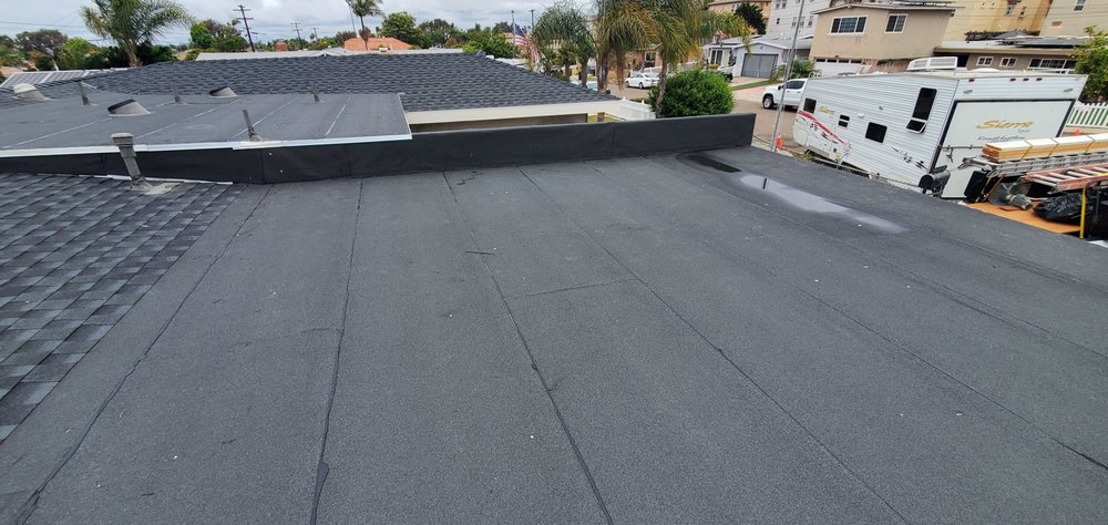 Slide of Araujo Roofing