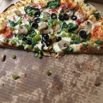 Pizza Quick - a half eaten pizza in a box - Italian Near Me - Valdosta, Georgia