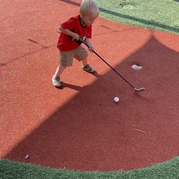 Higher Ground Char House - A putting green for the kiddos - Burgers Near Me - Chapin, South Carolina Higher Ground Char House - A putting green for the kiddos - Burgers Near Me - Chapin, South Carolina