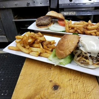 Bobby's Table - two plates of burgers and french fries - American Near Me - Ottawa, Ontario
