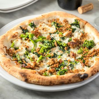 Nella Pizza e Pasta - a pizza on a plate - Pizza Near Me - Chicago, Illinois