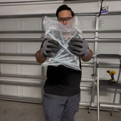 Active Garage Door Services - New nylon rollers being installed on this door during a tune up service. This is included with all of our tune up service calls.