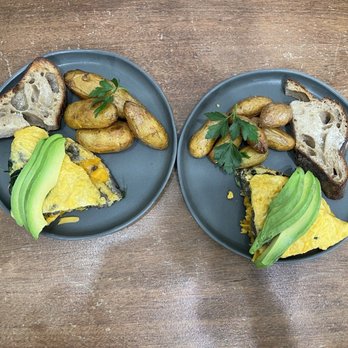 Nosh Napa - California omelet split between 2 plates. - Breakfast & Brunch Near Me - Napa, California Nosh Napa - California omelet split between 2 plates. - Breakfast & Brunch Near Me - Napa, California