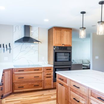 Keselman Construction Group - A touch of modernity: This kitchen blends rustic wooden textures with contemporary appliances and lighting. - General Contractors Near Me - Solon, Ohio