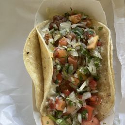 Fish taco. Actually tasty, just kinda soggy because of all the garnish and pico de gallo, which I love but maybe put on the side.