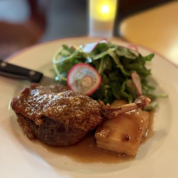 Amélie - Duck Leg Confit - Grimaud farm duck leg with gratin dauphinois, salad, duck jus - Wine Bars Near Me - San Francisco, California Amélie - Duck Leg Confit - Grimaud farm duck leg with gratin dauphinois, salad, duck jus - Wine Bars Near Me - San Francisco, California