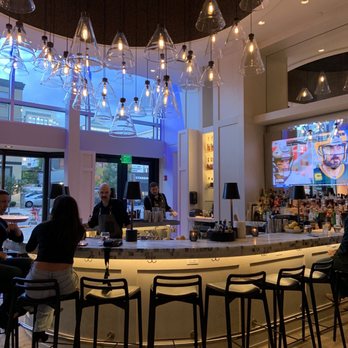 Patina 250 - people sitting at the bar - New American Near Me - Buffalo, New York
