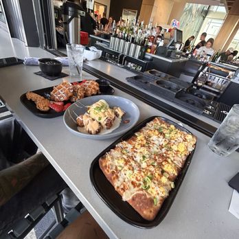 The Goat Pflugerville - Breakfast flatbread, Nashville chicken & waffles & breakfast tots (so yummy) - Bars Near Me - Pflugerville, Texas The Goat Pflugerville - Breakfast flatbread, Nashville chicken & waffles & breakfast tots (so yummy) - Bars Near Me - Pflugerville, Texas