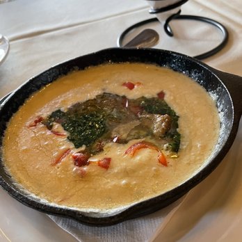 Roaring Fork - Queso con puerco accompanied by house-made tortilla chips - American Near Me - Scottsdale, Arizona