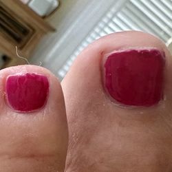 Bellagio Hair and Nails - Polish doesn't cover nails on sides and all the tips look like this.