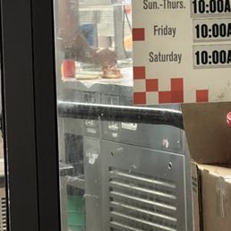 a sign in a restaurant window