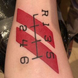 manual shift pattern w/ two rally stripes (Bruise on number 6 is from working on car prior to tattoo and not from Ariel's work) manual shift pattern w/ two rally stripes (Bruise on number 6 is from working on car prior to tattoo and not from Ariel's work)