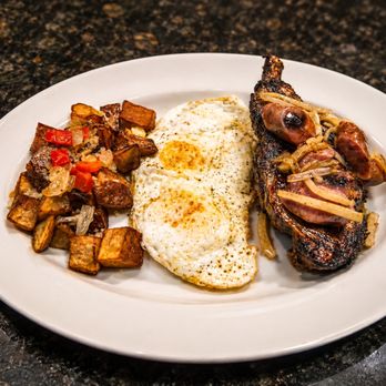 The Grill - Breakfast Pork Chop - New American Near Me - San Angelo, Texas The Grill - Breakfast Pork Chop - New American Near Me - San Angelo, Texas
