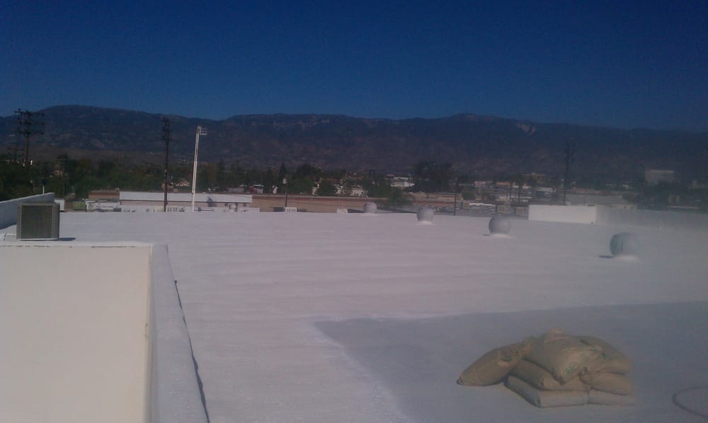 Slide of Foam Bond-A Quality Roofing