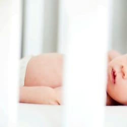 Jackie Zoeller Photography - Baby Photographer in Denver. This is the first time that baby Brooks laid in his crib.
