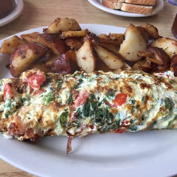 Tin Can Cafe - Spinach and feta omelet, had tomatoes added! - Cafes Near Me - Clearwater, Florida Tin Can Cafe - Spinach and feta omelet, had tomatoes added! - Cafes Near Me - Clearwater, Florida