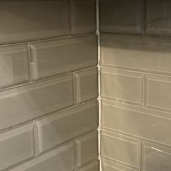Quality Floor Kitchen & Bath - Imperfections of tile placements and sloppy caulking