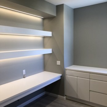 Anderson Built - Home office with custom shelves, computer desk and cabinets. Custom recessed lighting as well. All light dimmable for proper lighting needs. - General Contractors Near Me Anderson Built - Home office with custom shelves, computer desk and cabinets. Custom recessed lighting as well. All light dimmable for proper lighting needs. - General Contractors Near Me
