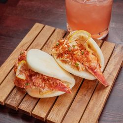 The Lass Stop - Maine Lobster Bao, served with preserved lemon relish and a butter-garlic crunch!