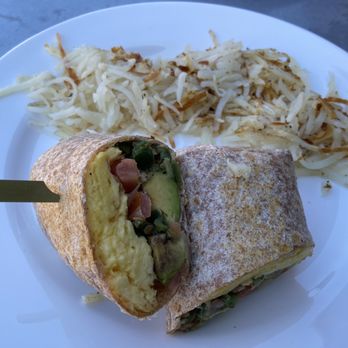 Elly's Brunch & Cafe - Avocado Wrap w/hashbrowns ($9) - 2 scrambled eggs, avocado, pico, wheat tortilla. Warm on the outside, yummy on the inside. - Breakfast & Brunch Near Me - Phoenix, Arizona