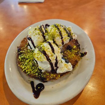 Gyro House Mediterranean Grill - Kanafe with vanilla ice cream and pistachios - Mediterranean Near Me - Beaverton, Oregon Gyro House Mediterranean Grill - Kanafe with vanilla ice cream and pistachios - Mediterranean Near Me - Beaverton, Oregon