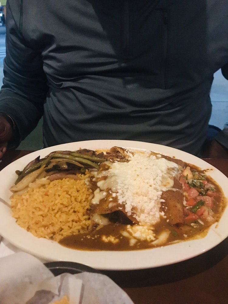 Order BRISKET ENCHILADAS food online from Taqueria Los Hermanos store, Tucker on bringmethat.com