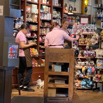 Cracker Barrel Old Country Store - Hostess with the mostest on her phone again, while two general store employees load up the stuffed animal carousel. - American Near Me - Murrells Inlet, South Carolina Cracker Barrel Old Country Store - Hostess with the mostest on her phone again, while two general store employees load up the stuffed animal carousel. - American Near Me - Murrells Inlet, South Carolina