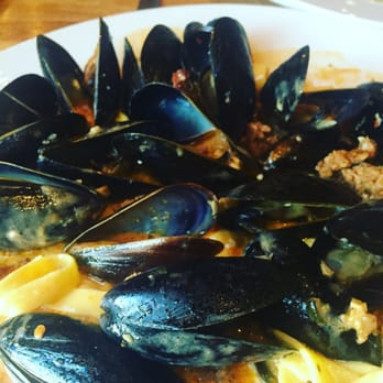 Angelo’s Taverna - Mussels in chorizo sauce over homemade linguine. Delectable! - Italian Near Me - Denver, Colorado