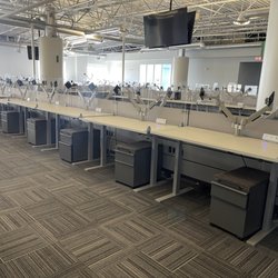Southwest Modular - Used Rising Electric Tables as shown with pedestals, panels, monitor arms, and all powered.  $850.00
