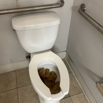Bolton's Landing - Men's bathroom clogged toilet - Apartments Near Me - Charleston, South Carolina Bolton's Landing - Men's bathroom clogged toilet - Apartments Near Me - Charleston, South Carolina