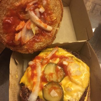 McDonald's - a cheeseburger and a burger - Fast Food Near Me - Arnold, Missouri McDonald's - a cheeseburger and a burger - Fast Food Near Me - Arnold, Missouri
