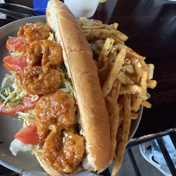 Zef’s Dockside Bar & Kitchen - Shrimp po boy - Bars Near Me - St Clair Shores, Michigan Zef’s Dockside Bar & Kitchen - Shrimp po boy - Bars Near Me - St Clair Shores, Michigan