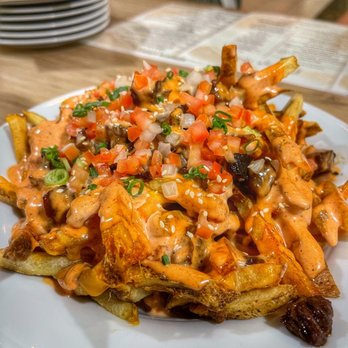 Sprigs Grille Restaurant - a plate of french fries - Seafood Near Me - Kapolei, Hawaii