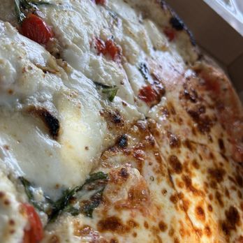 Nomadic Pizza - half and half - Pizza Near Me - Haleiwa, Hawaii Nomadic Pizza - half and half - Pizza Near Me - Haleiwa, Hawaii