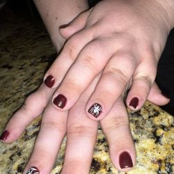Onyx Nails - Red glitter gel nails with a HAND DRAWN spider design