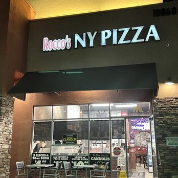 Rocco's NY Pizzeria & Pasta - Front of building at Village Center Cir. I got burned out on pizza when I was a kid, but I love Roccosxd ft - Pizza Near Me - Las Vegas, Nevada Rocco's NY Pizzeria & Pasta - Front of building at Village Center Cir. I got burned out on pizza when I was a kid, but I love Roccosxd ft - Pizza Near Me - Las Vegas, Nevada
